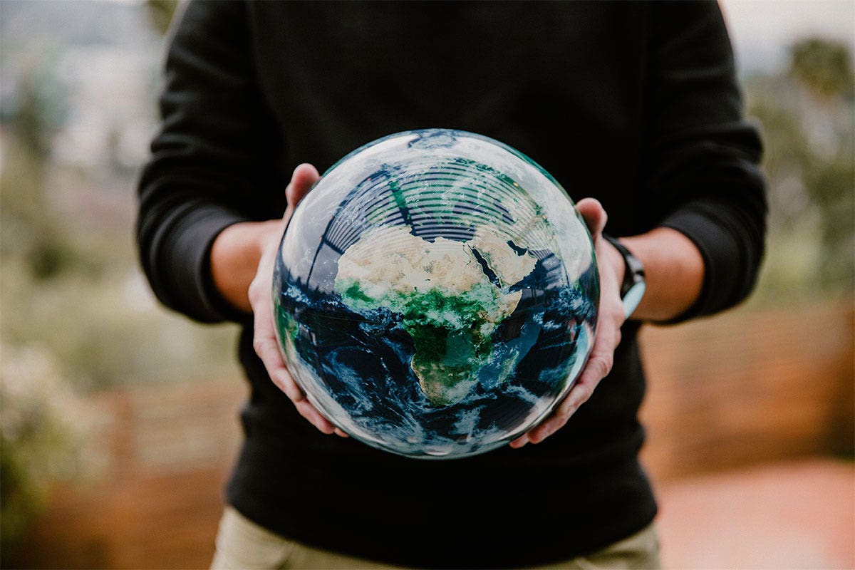 MOVA Globe Held in Hand
